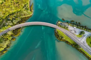 Prints of Small town of waiwera in Auckland, New Zealand New Zealand Prints: Top looking down at bridge over waiwera river