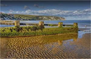 Images Dated 19th September 2012: Low tide in the seaside village of Swanage, on the Jurassic coastline of Dorset, England