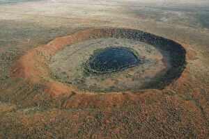 Images Dated 12th June 2023: Majestic aerial image showing Wolfe Creek Meteorite Crater, Western Australia, Australia