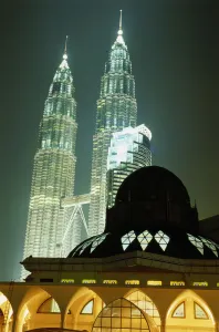 Malaysia, Kuala Lumpur, Petronas Towers, mosque in foreground, night Malaysia, Kuala Lumpur, Petronas Towers, mosque in foreground, night