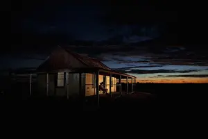Loneliness Prints: man in front of outback shed