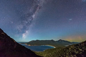James Stone Nature Photography Collection: Milky Way and Aurora over a moonlit Wineglass Bay