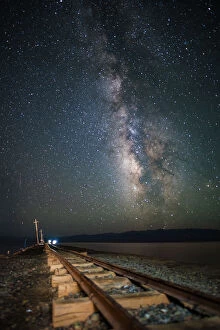Images Dated 21st May 2016: Milky way and mining railway track in Chaka Salt Lake on Qinghai-Tibetan Plateau, China