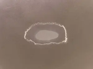 Images Dated 10th August 2023: Minimal drone image looking down on an oval shaped salt formation
