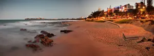 Mooloolaba Beach in the early evening at dusk with the lights of the buildings lit up