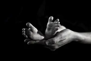 Kathryn Diehm Prints: New born feet and mothers hands