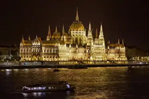 The Night Lights of The Hungarian Parliament Building Along River Danube, Budapest, Hungary