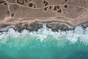 Images Dated 20th July 2023: Ocean waves crashing into the Bunda Cliffs photographed from a drone point of view, Nullarbor