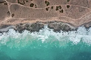 Ocean waves crashing into the Bunda Cliffs photographed from a drone point of view, Nullarbor, South Australia, Australia