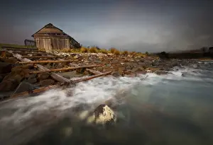 Kathryn Diehm Prints: Old boat shed with waves and rocks