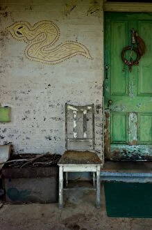 Images Dated 16th October 2014: old chair and green door