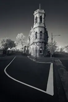Building Prints: Old landmark building and quiet street with bicycles and road markings in Melbourne