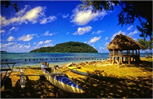 Outrigger canoe and Coastline on The Island of Upolu, Western Samoa Outrigger canoe and Coastline on The Island of Upolu, Western Samoa