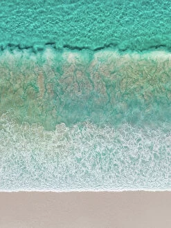 Abstract Aerial Art Collection: Overhead shot showing Ocean waves breaking onto a beach, Lucky Bay, Esperance, Western Australia