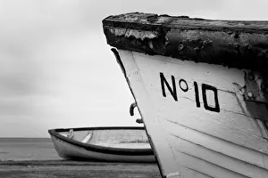 Pair of rustic rowing boats Pair of rustic rowing boats