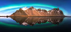 Panoramic view of Aurora Borealis Over Vestrahorn Mountains