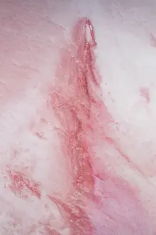 Abstract Aerial Art Prints: Pattern on the surface of a pink coloured salt lake shot from a birds-eye point of view