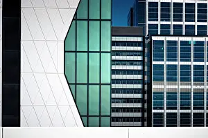 Robbie Goodall Photography Prints: Photo of three modern skyscrapers standing side by side against a blue sky - Perth
