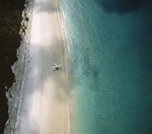 Plane on beach, aerial view