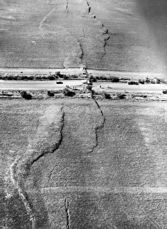 <b class=qtipBold><figcaption>Quake Line</figcaption></b><br>Fissures caused by an earthquake, running through the Great Eastern Highway and surrounding wheat fields near Meckering, Western Australia.<br><em>© This content is subject to copyright.</em> Quake Line