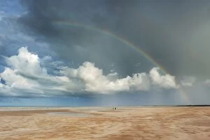 Images Dated 23rd February 2014: Rainbow over Lee Point Beach walkers