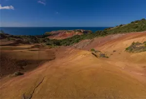 Images Dated 11th August 2014: The rich red and ochre hues of the scarred landscape on Phillip island