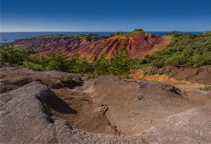 Images Dated 11th August 2014: The rich red and ochre hues of the scarred landscape on Phillip island