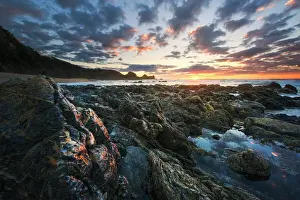 Rising sun at Camel Rock beach, South coast of Australia