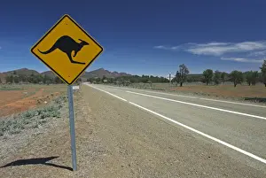 Traffic Prints: Road sign warning of kangaroos, Flinders Ranges, South Australia, Australia