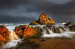 Kathryn Diehm Prints: Rock seascape at sunset dark clouds