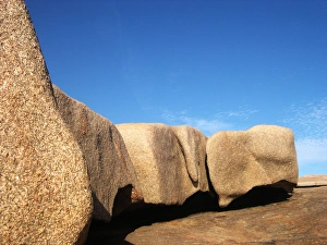 <b class=qtipBold><figcaption>Rocks And Blue Sky</figcaption></b><br>A coastal rock formation in Western Australia near the town of Esperance, taken on a bright sunny day with a blue sky. Rocks And Blue Sky