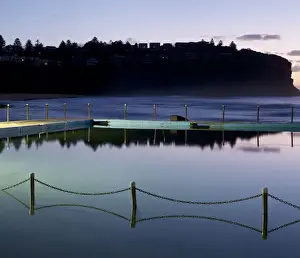 Northern Beaches Prints: Sea Pool with chain fence reflecting in the still sea water Bilgola New South Wales Australia