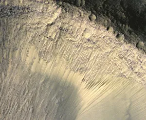 Mars Reconnaissance Orbiter (MRO) Prints: Seasonal Changes in Dark Marks on an Equatorial Martian Slope