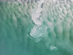 Aerial Beach Photography Prints: Sediment flowing from Willie Creek into the Indian Ocean shot from an aerial perspective