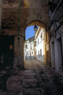 Images Dated 4th December 2011: Seville old town narrow passage and white building