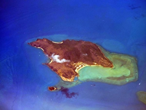 Small puff of cloud hovers over Hayman Island Small puff of cloud hovers over Hayman Island