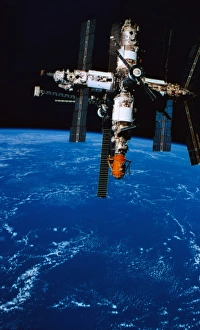 A space station in orbit above earth A space station in orbit above earth