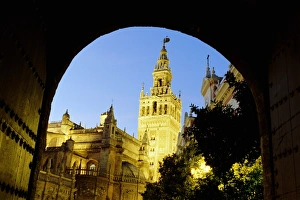 Spain, Andalucia, Seville, cathedral exterior, low angle view, dusk Spain, Andalucia, Seville, cathedral exterior, low angle view, dusk