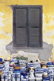 John W Banagan Prints: Stacks of Pottery by Window