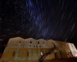 Images Dated 26th April 2014: Star-trails appearing over an old warehouse, Oamaru, South Island, New Zealand