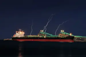 Images Dated 29th May 2023: Stormy dramatic sky with lightning breaking over a ship at Port Lincoln