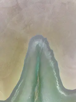 Stream of water from the King River shot from a birds-eye perspective, Wyndham, Western Australia, Australia