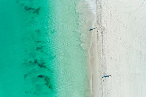 <b class=qtipBold><figcaption>Summer Sandy Beach Aerial</figcaption></b><br>Blue waters and white sandy beach from drone perspective<br><em>© © Neal Pritchard Photography</em> Summer Sandy Beach Aerial