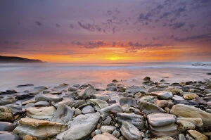 Images Dated 17th September 2012: Sunrise on rocky beach