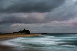Images Dated 2nd April 2017: sunrise and a stormy mood at lighthouse and beach