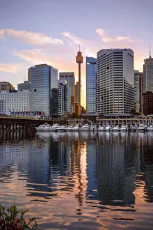 Sunrise View of Cockle Bay Wharf in Darling Harbour and Sydney Tower Eye, New South Wales, Australia Sunrise View of Cockle Bay Wharf in Darling Harbour and Sydney Tower Eye, New South Wales, Australia