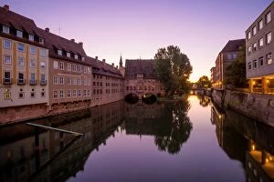 Images Dated 25th August 2016: Sunrise View of Pegnitz River and the Hospice of the Holy Spirit (Heilig-Geist-Spital), Nuremberg