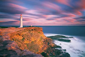 <b class=qtipBold><figcaption>Sunset at Cape Nelson</figcaption></b><br>Cape Nelson lighthouse at sunset, Portland, Victoria, Australia.<br><em>© 2011 Yury Prokopenko</em> Sunset at Cape Nelson