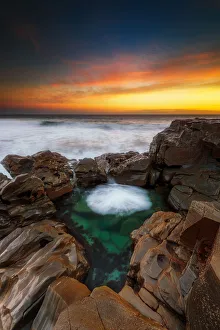 Sunset at a rocky beach Sunset at a rocky beach