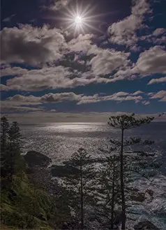 Common Sunstar Prints: Sunstar and clouds along the Norfolk Island coastline